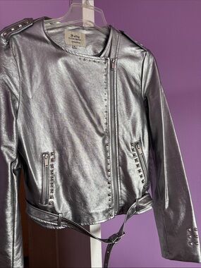 Silver jackets with belt and studs